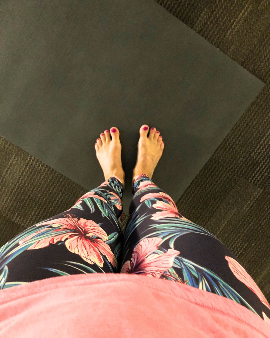 Bare feet on a yoga mat